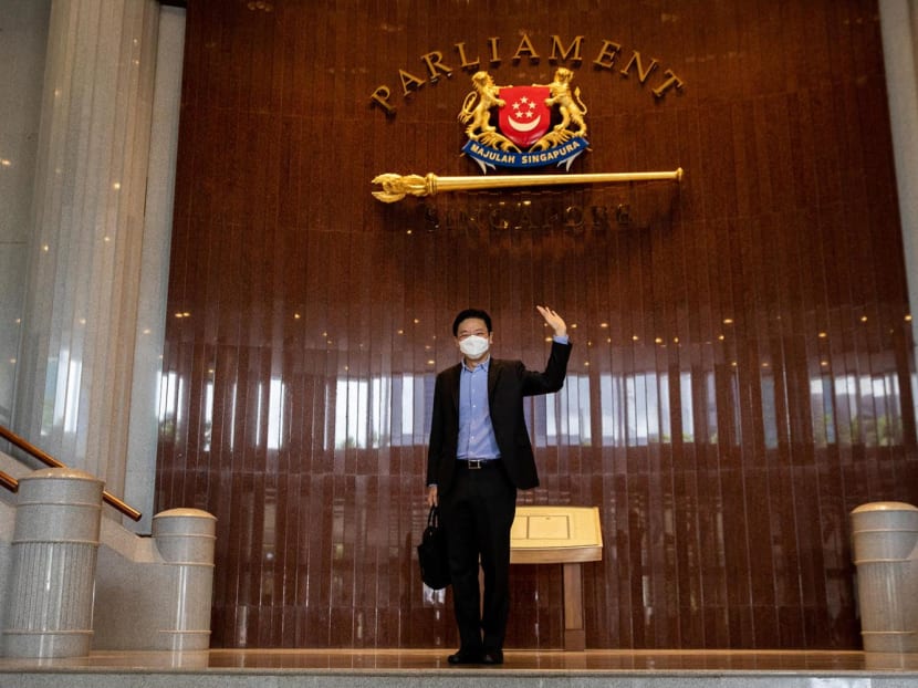 Finance Minister Lawrence Wong arriving at the Parliament House to deliver the Budget speech on Feb 18, 2022.