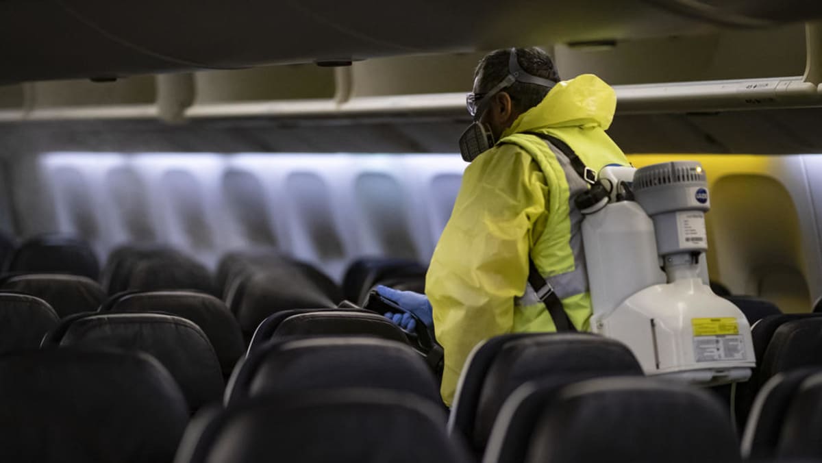 Face masks, health checks and long checkins The future of flying TODAY