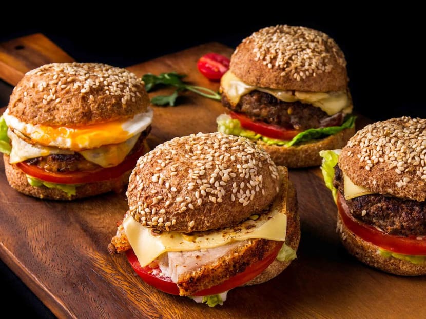 A regular burger bun has about 21 grams worth of carbs.