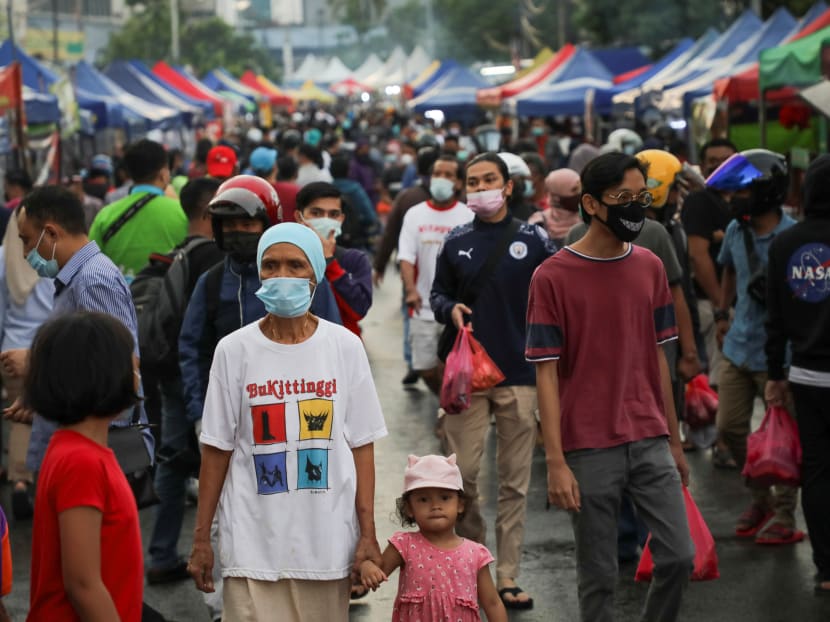 Muslims wearing protective masks shop for food before iftar (breaking fast) at a Ramadan bazaar, amid the Covid-19 outbreak, in Kuala Lumpur, Malaysia on Thursday, April 15, 2021.