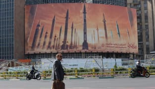 An anti-Israel billboard with a picture of Iranian missiles is seen in a street in Tehran, Iran on April 15, 2024.