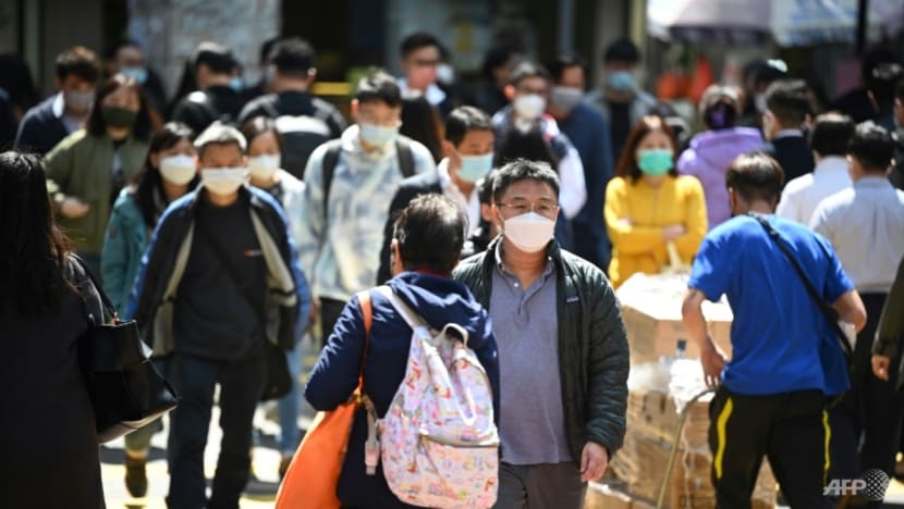 Hong Kong scraps one of world's last COVID-19 mask mandates - CNA