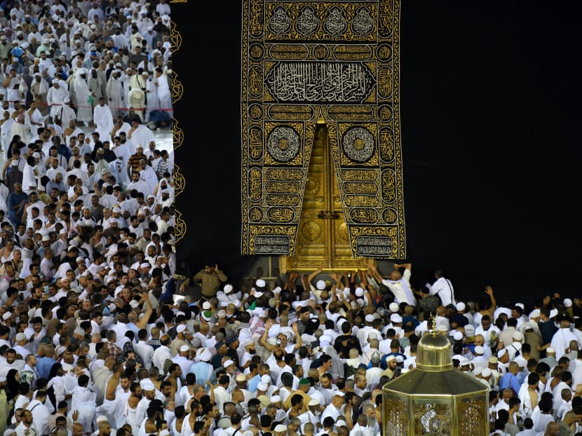 Muslims perform Umrah around the holy Kaaba at the Great Mosque during the holy fasting month of Ramadan in Mecca, Saudi Arabia.
