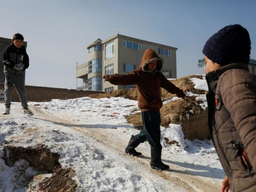 Afghan boys slide down a snow-covered slope in Kabul, Afghanistan, Jan 26, 2023. Afghan boys slide down a snow-covered slope in Kabul, Afghanistan, Jan 26, 2023.