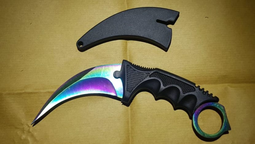 7 arrested for rioting while armed with karambit knife
