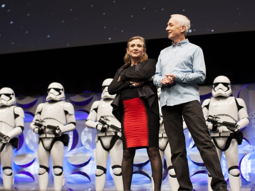 Original Star Wars cast members Carrie Fisher and Anthony Daniels (right) appear at the kick-off event of the Star Wars Celebration convention in Anaheim, California, April 16, 2015. REUTERS file photo