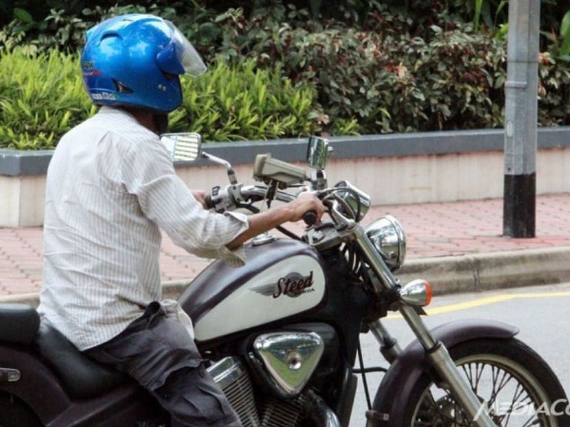 A motorcyclist in Singapore. Channel NewsAsia file photo