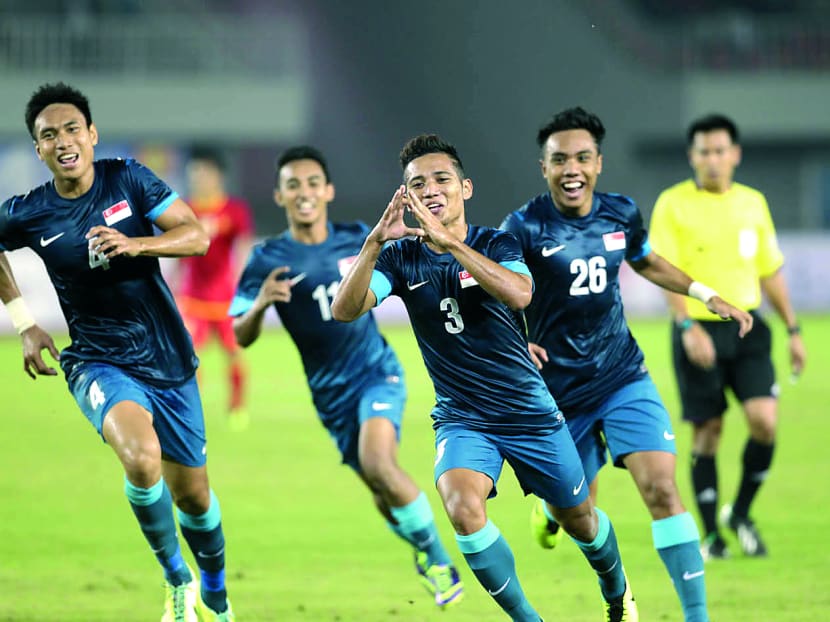 Sahil (No 3) and his team-mates celebrating the winner against Vietnam. The Young Lions are now top of Group A with four points. Photo: Wee Teck Hian