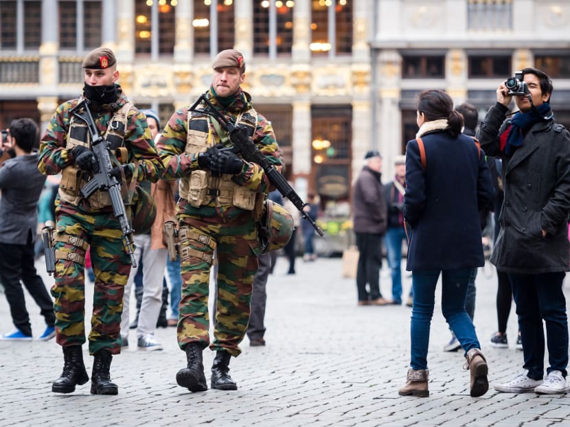 Belgian Army soldiers patrol in the picturesque Grand Place in the center of Brussels on Friday, Nov. 20, 2015. Photo: AP