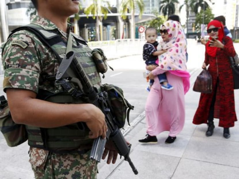 Security forces patrolling in Kuala Lumpur. Malaysia is beefing up its security at entry and exit points around the country. Reuters file photo