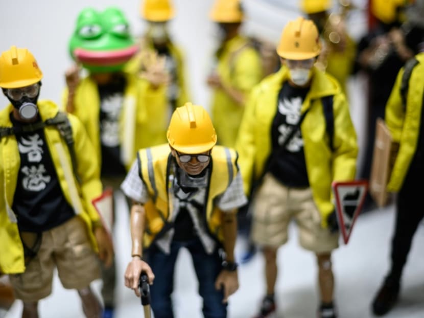 A local figurine enthusiast and his friend designed dozens of characters based on their own experiences of attending months of protests.