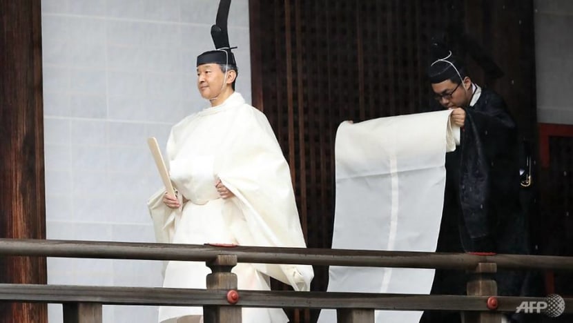 Japanese emperor begins enthronement ritual amid downpour