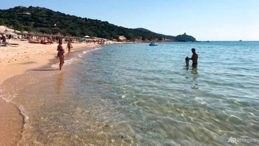 Italian police seize sand, shells; fine tourists in Sardinia