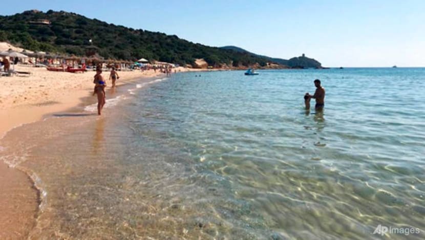 Italian police seize sand, shells; fine tourists in Sardinia Italian police seize sand, shells; fine tourists in Sardinia