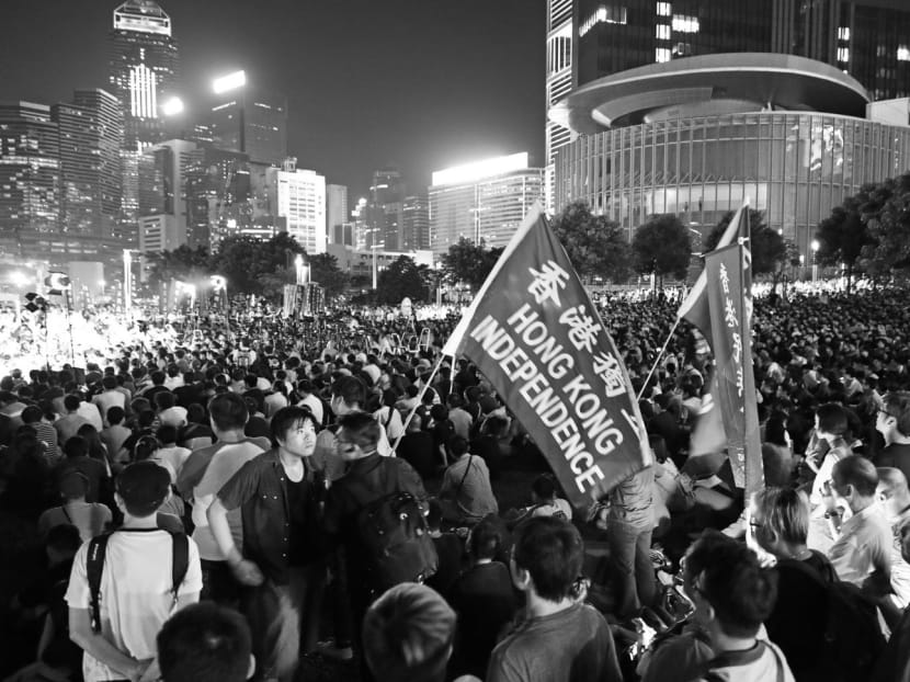 Demonstrators rallying outside the Hong Kong government headquarters on Aug 5 as they demand Hong Kong’s independence. The writer believes Hong Kong is tiny compared with the mainland, in all respects, and that the only alternative — a peaceful one — is for China to want Hong Kong to be independent. Photo: AP