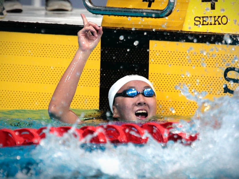 Quah Jing Wen splashes the water in joy after winning the SEA Games women's 200m butterfly. Photo: Jason Quah / TODAY