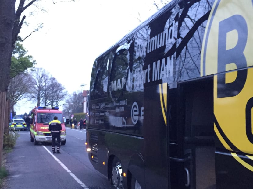 A window of the bus of Borussia Dortmund is damaged after an explosion before the Champions League quarterfinal soccer match against AS Monaco in Dortmund, western Germany. Photo: AP