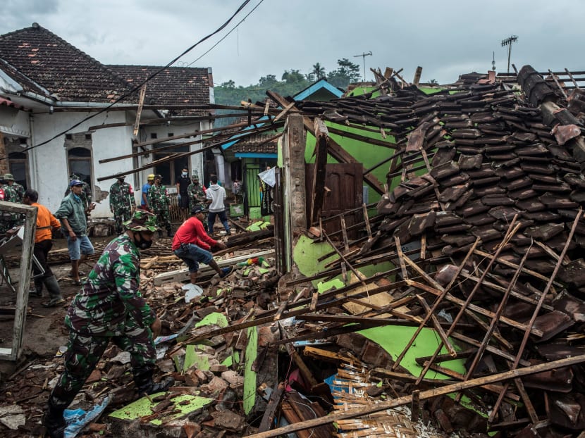Indonesian soldiers and residents check damaged houses in Malang, East Java, Indonesia on April 11, 2021, a day after a 6.0-magnitude quake struck off the coast of Indonesia’s main Java island. Indonesian soldiers and residents check damaged houses in Malang, East Java, Indonesia on April 11, 2021, a day after a 6.0-magnitude quake struck off the coast of Indonesia’s main Java island.