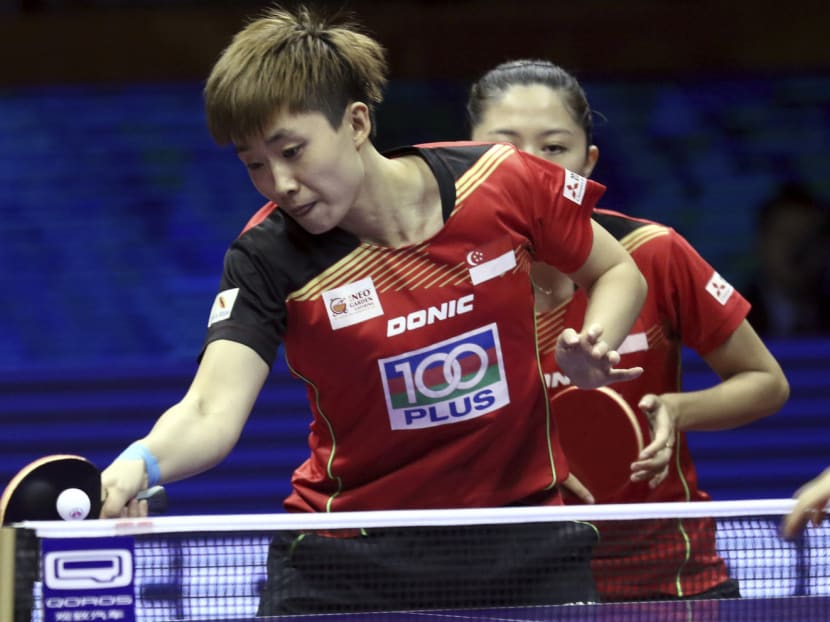 Feng (left) and Yu lost 4-1 to their Chinese opponents. Photo: Chinatopix via AP