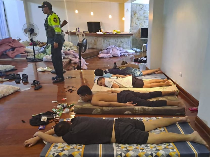 This handout picture released on Oct 9, 2023, by the Peruvian Ministry of Interior shows some of the 44 Asian migrants rescued by the police during a raid between Oct 7 and 8 in Lima. This handout picture released on Oct 9, 2023, by the Peruvian Ministry of Interior shows some of the 44 Asian migrants rescued by the police during a raid between Oct 7 and 8 in Lima.