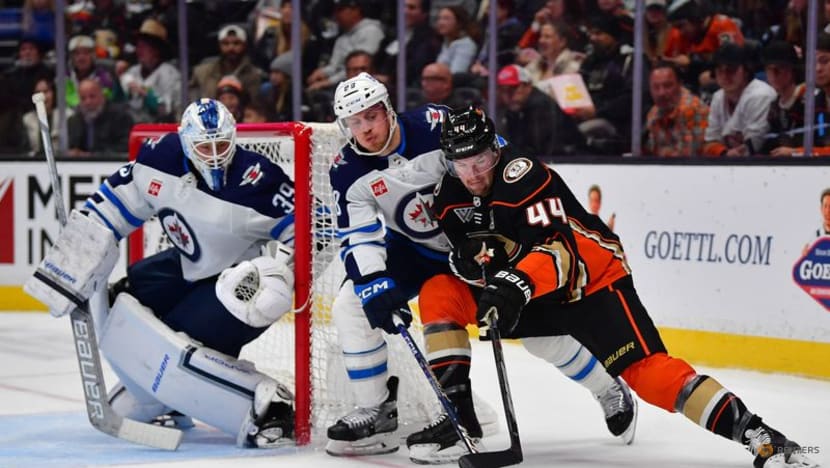 NHL roundup: Connor Bedard hurt as Blackhawks fall to Devils - CNA