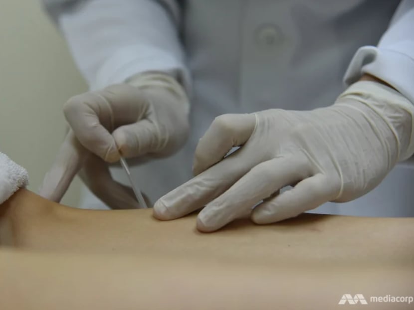 Lim Ah Bah is accused of performing two sexual acts on a woman during a treatment session at a TCM clinic. Lim Ah Bah is accused of performing two sexual acts on a woman during a treatment session at a TCM clinic.