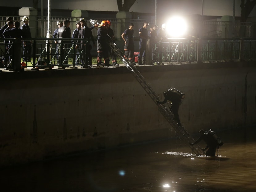 2 women killed after car plunges into Singapore River