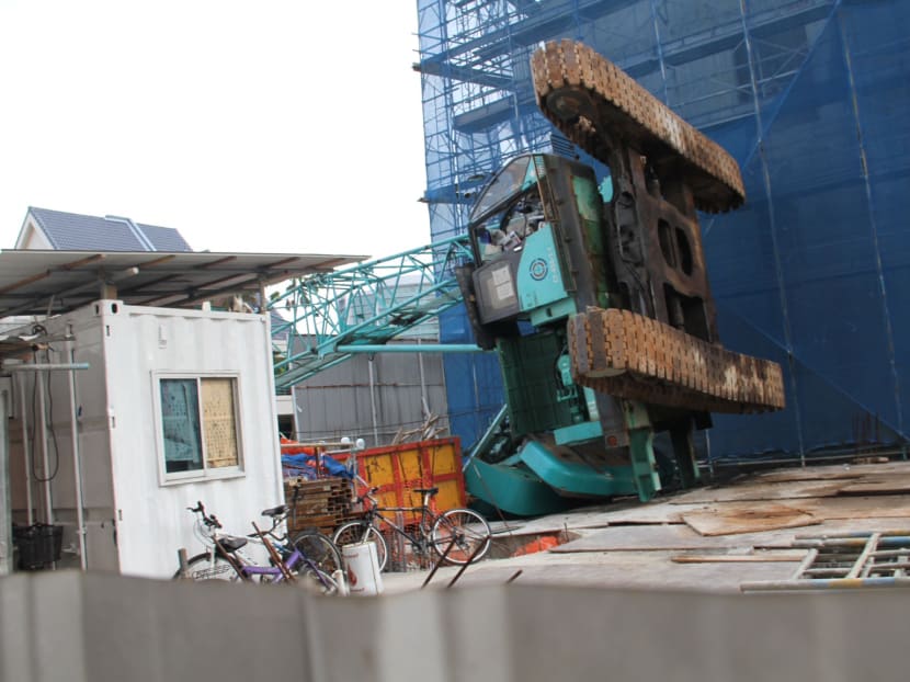 A tipped over crane seen at the construction site of Sant Ritz along Pheng Geck Avenue, Potong Pasir. Photo: Don Wong