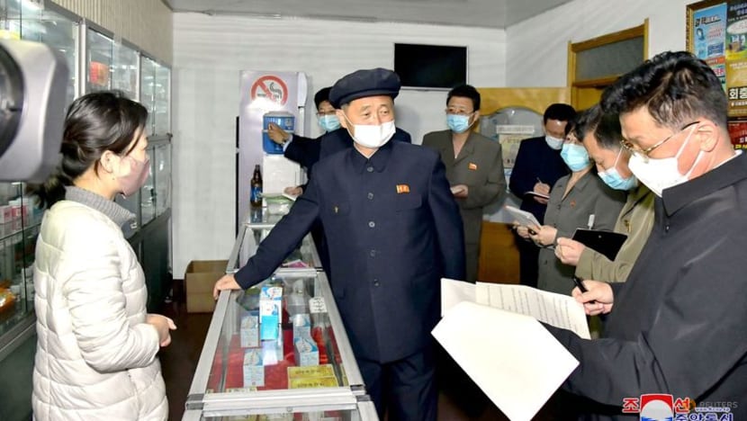 North Korea says new fever cases under 100,000 as COVID-19 fight heats up