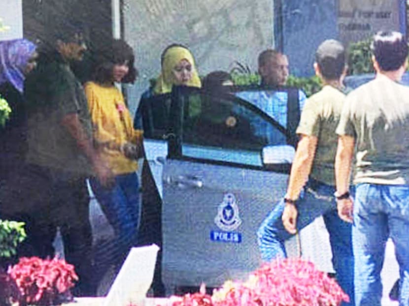 Footage by Chinese state media showing the second woman (in yellow top) suspected of assassinating Kim Jong-nam, the estranged half-brother of North Korean leader Kim Jong-un at the Kuala Lumpur International Airport on Monday. Photo: Reuters