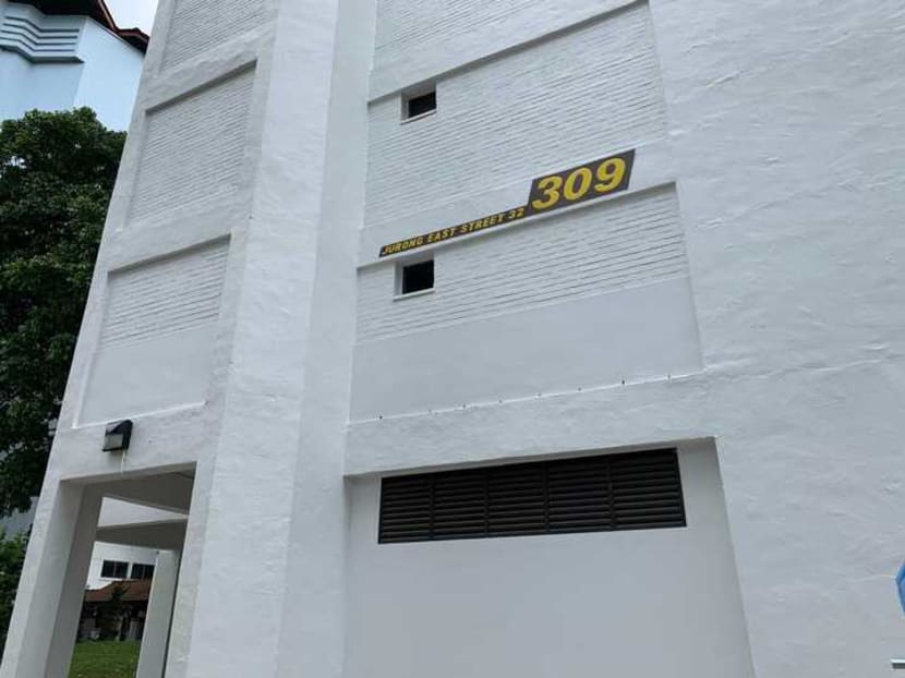 Residents of Block 309 in Jurong East Street 32 heard a commotion before seeing a 34-year-old woman covered in blood at the foot of neighbouring Block 308.