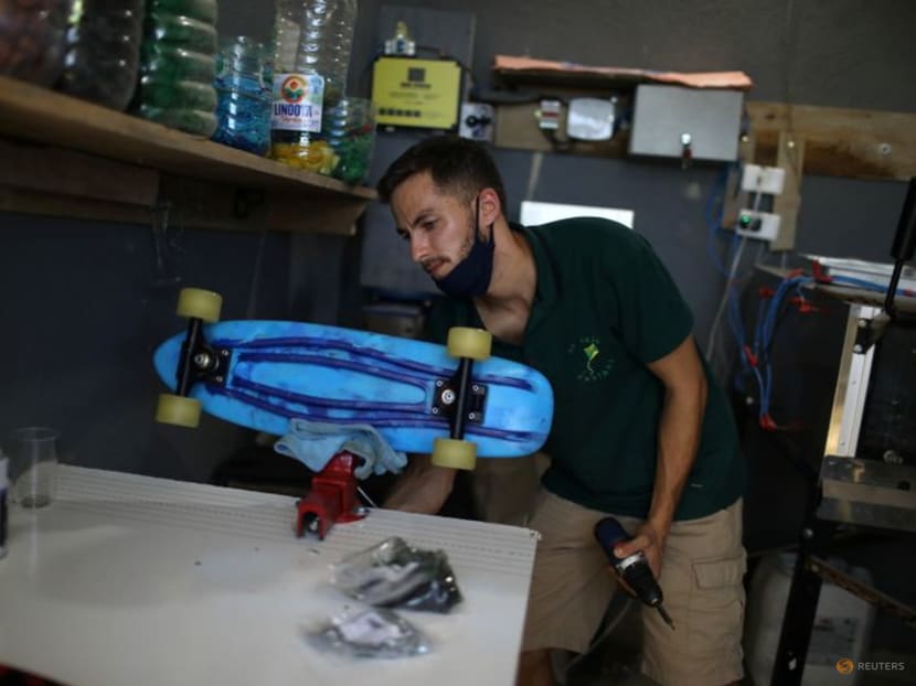 In Brazil favela, skateboards made of bottle caps promote recycling In Brazil favela, skateboards made of bottle caps promote recycling