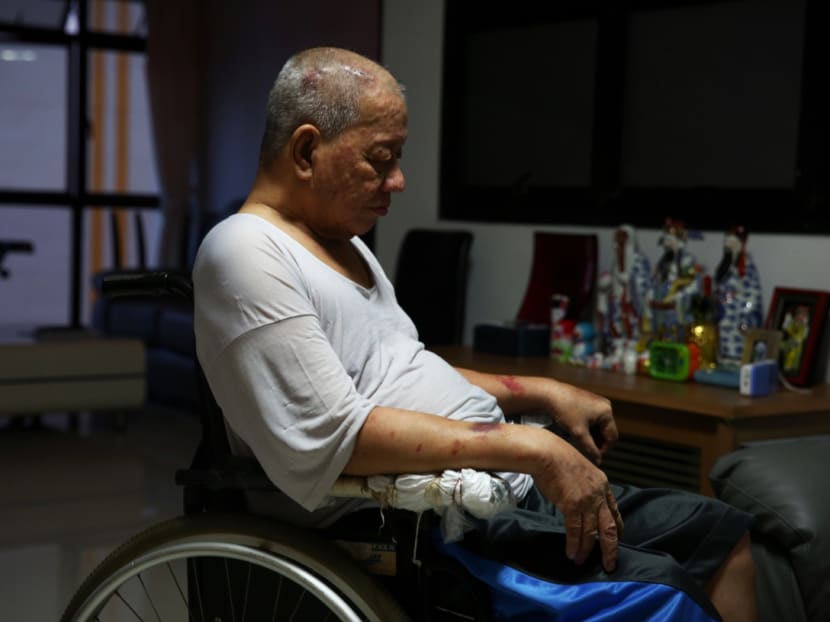 Mr Choy Mun Yew, 70, slipped while wheeling up a ramp in the handicapped toilet at Jurong West Food Centre and Market, causing internal bleeding in his brain. Photo: Nuria Ling/TODAY