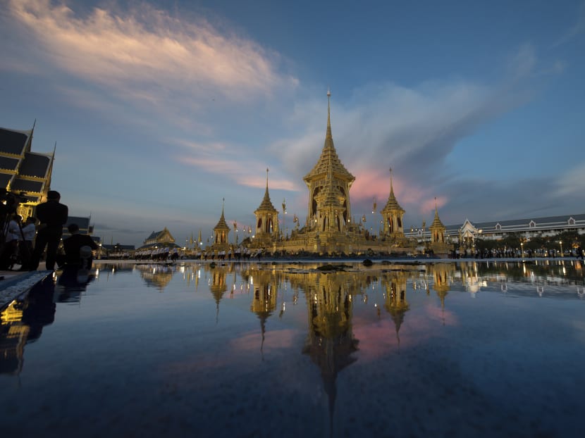Dawn light fades behind the completed royal crematorium and funeral complex for the late Thai King Bhumibol Adulyadej Bangkok, Thailand. Photo: AP