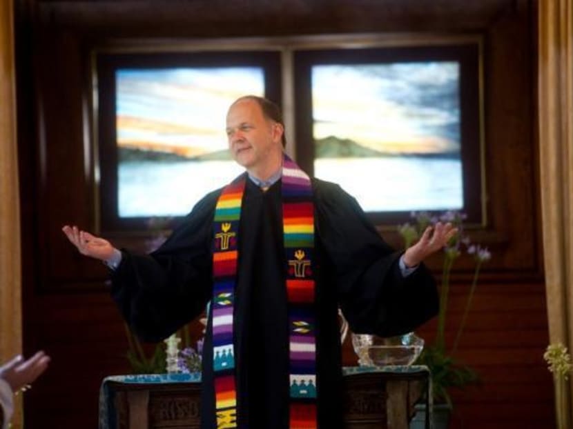 Reverend Paul Mowry leads a Sunday service at Sausalito Presbyterian Church in Sausalito, California. Photo: Reuters
