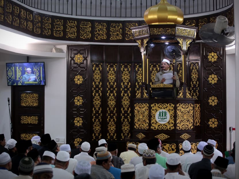 Singapore's mufti Dr Mohamed Fatris Bakaram addressing congregants at the Al-Mukminin Mosque on the morning of Hari Raya Aidilfitri on Sunday (June 25). Photo: Jason Quah/TODAY Singapore's mufti Dr Mohamed Fatris Bakaram addressing congregants at the Al-Mukminin Mosque on the morning of Hari Raya Aidilfitri on Sunday (June 25). Photo: Jason Quah/TODAY