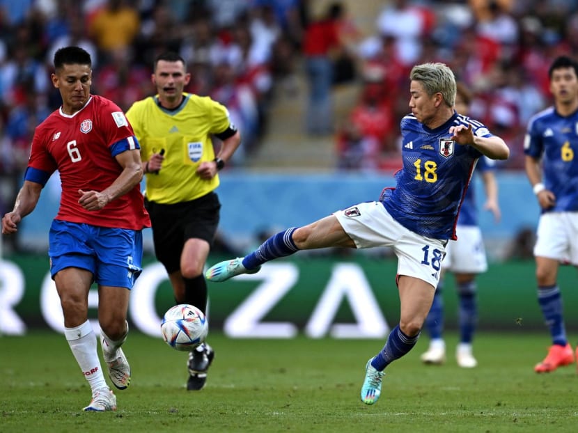 Japan forward Takuma Asano fights for the ball with Costa Rica defender Oscar Duarte during the Qatar 2022 World Cup Group E football match between Japan and Costa Rica at the Ahmad Bin Ali Stadium in Al-Rayyan, Doha on Nov 27, 2022. Japan forward Takuma Asano fights for the ball with Costa Rica defender Oscar Duarte during the Qatar 2022 World Cup Group E football match between Japan and Costa Rica at the Ahmad Bin Ali Stadium in Al-Rayyan, Doha on Nov 27, 2022.