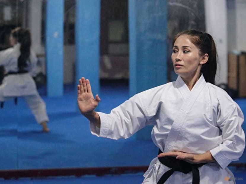 Afghan karate champion fears it's game over for female athletes after Taliban takeover Afghan karate champion fears it's game over for female athletes after Taliban takeover