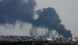 Israeli forces push into Gaza from north and south