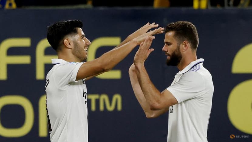 Nacho and Asensio score late to give Real Madrid 2-0 win at Cadiz Nacho and Asensio score late to give Real Madrid 2-0 win at Cadiz