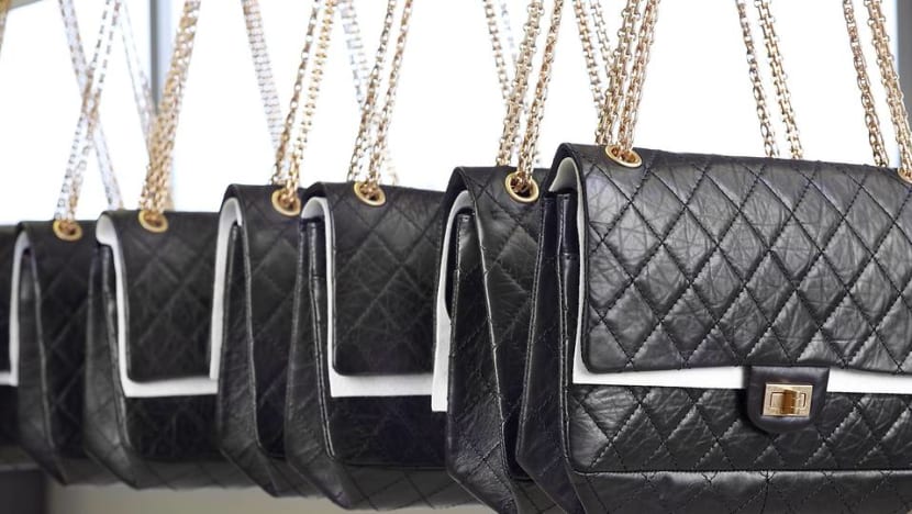 What makes that designer handbag so expensive?