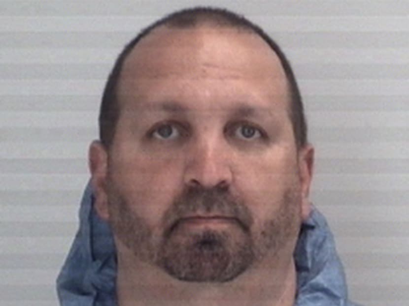 A booking mug handout of Craig Stephen Hicks, who has been arrested and charged with fatally shooting three people at a condominium complex near the University of North Carolina at Chapel Hill campus, police said. Photo: Durham County Sheriff's Office/The New York Times