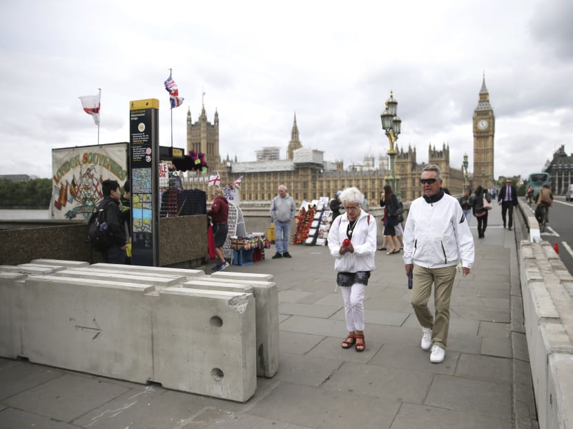 Security barriers are seen on Westminster Bridge in London, following a terrorist attack that killed several people. Bollards and security barriers may soon be used to bolster security in public spaces in Singapore, amid the spate of terrorist attacks overseas involving vehicles driven into crowds. Photo: AP