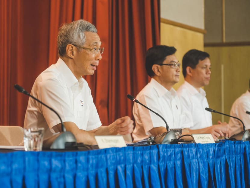 Deputy Prime Minister Heng Swee Keat (second from left) has been widely tipped to take over from Prime Minister Lee Hsien Loong (left).