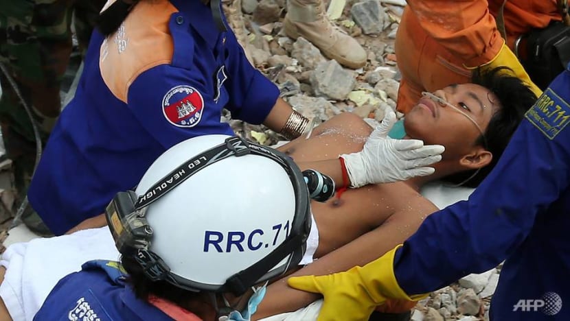 Two survivors pulled from rubble of collapsed Cambodia building Two survivors pulled from rubble of collapsed Cambodia building