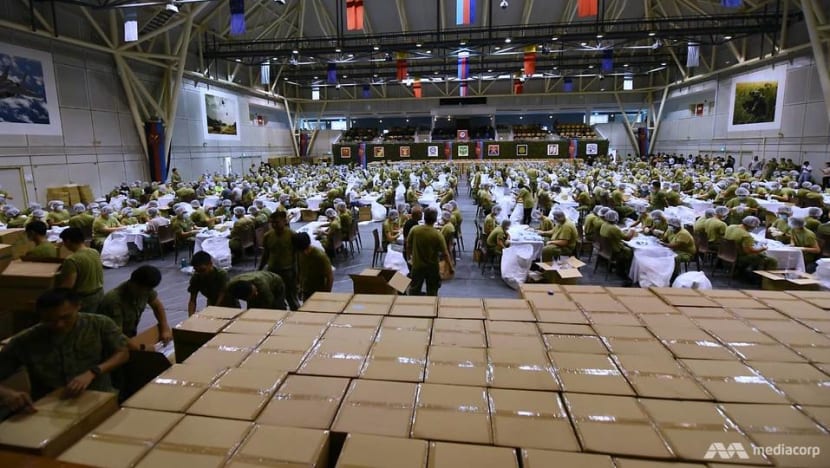 Wuhan coronavirus: 1,500 SAF personnel packing 5.2m masks in 24-hour operation Wuhan coronavirus: 1,500 SAF personnel packing 5.2m masks in 24-hour operation