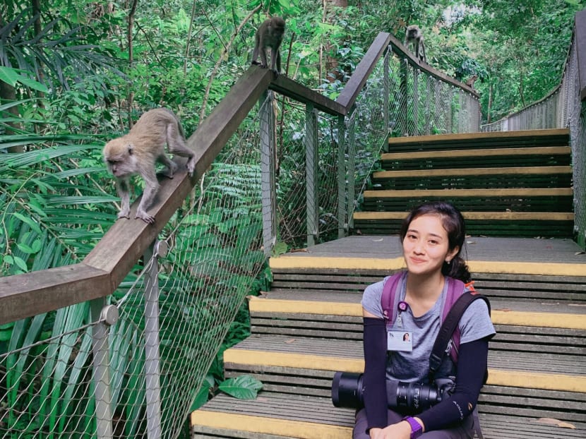 The author with long-tailed macaques at Windsor Nature Park in 2019. The author with long-tailed macaques at Windsor Nature Park in 2019.