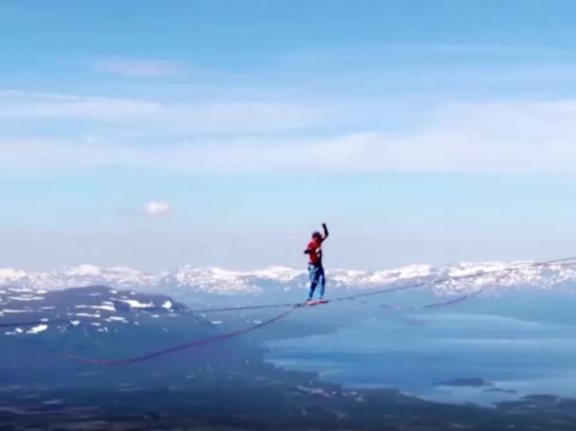 World record as tightrope walkers cross Swedish Arctic valley 600m up World record as tightrope walkers cross Swedish Arctic valley 600m up