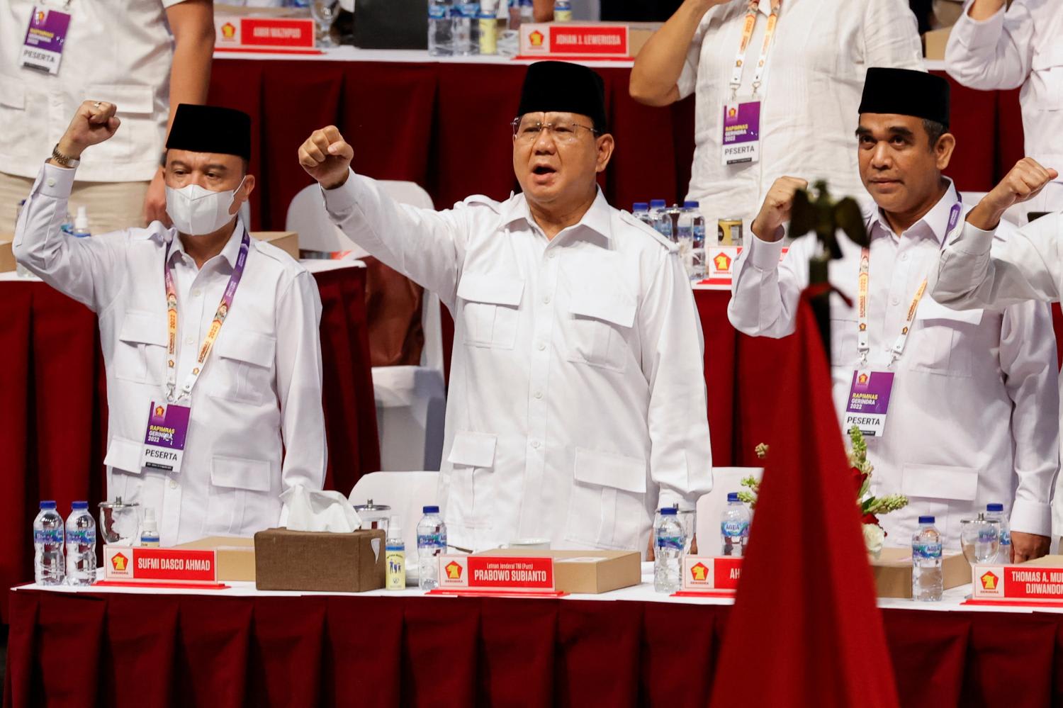 Indonesia's defence minister Prabowo Subianto (centre), who was the former general of Indonesian Army Special Forces, gestures while attending Gerindra Party leaders national meeting, in Bogor, Indonesia on Aug 12, 2022. 
