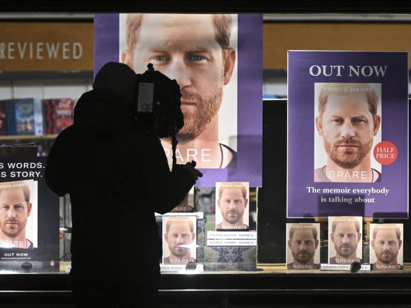 A member of the media films the display window of Waterstones' flagship Piccadilly bookshop announcing the release of "Spare" by Britain's Prince Harry, Duke of Sussex, in London, on Jan 10, 2023. A member of the media films the display window of Waterstones' flagship Piccadilly bookshop announcing the release of "Spare" by Britain's Prince Harry, Duke of Sussex, in London, on Jan 10, 2023.